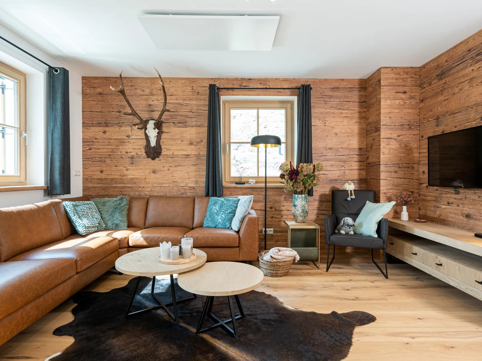 Haus Liene - Welcoming living area with Smart TV, comfortable seating and alpine charm for entertainment during your vacation