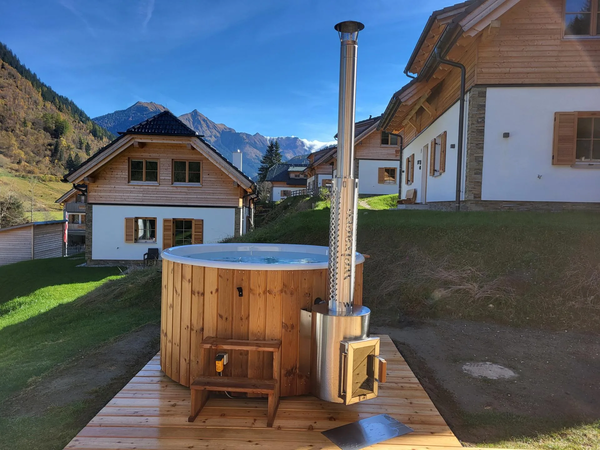 Haus Liene - Premium outdoor hot tub on the private deck with spectacular views of the Austrian Alps for ultimate relaxation