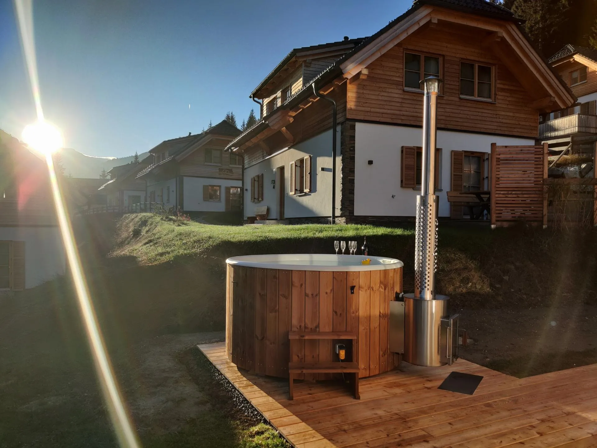 Haus Liene - Private wellness area with spa deck offering spectacular mountain views, perfect for relaxation after skiing or hiking